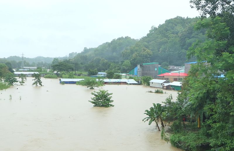 Heavy rainfall and onrush of upstream water flooded Rangamati Sadar. The picture was taken at Sapchhori BSCIC industrial area on Thursday.